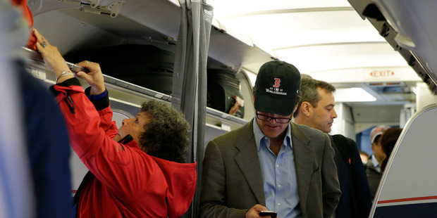 Both Republican and Democratic House members said they believe in-flight calls would be noisy and disturbing to other passengers and possibly disruptive. Photo / AP