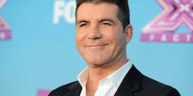 Simon Cowell's partner, Lauren Silverman, gave birth to a healthy baby boy named Eric. Photo / AP