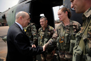 French Defense Minister Jean-Yves le Drian Greets French helicopter crew at the airport in Bangui, Central African Republic. Photo / AP