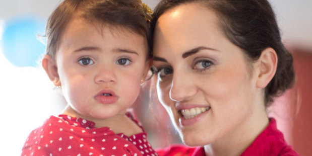 Sera Lilly, with daughter Amalia, has blamed cheap imports for her decision to close her bridal-wear business.