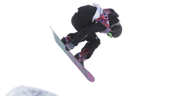 New Zealand's Stefi Luxton takes a jump during the women's snowboard slopestyle semifinal. Photo / AP