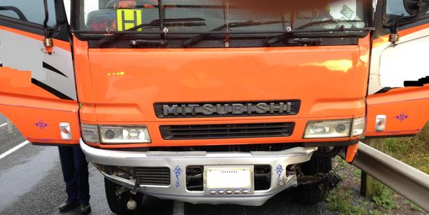 As the lanes merged into one the truck crashed into a concrete barrier. Photo / NZ Police