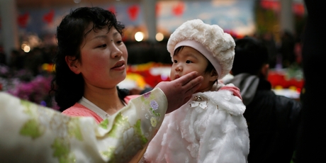 A little girl is part of the celebrations to mark the late leader Kim Jong Il's birthday. Photo / AP
