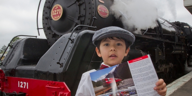 BLAST FROM PAST: Mac Fan-Robertson, 4, from Bay View, was one of many admirers of the Art Deco steam train as it stopped in Hastings for more passengers yesterday. PHOTO/ GLENN TAYLOR HBT140716-03