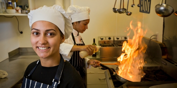 Kitchenhand Josilei Swistalski De Oliveira is on a working holiday from Brazil and says her wage is not enough to live on in Auckland. Photo / Greg Bowker