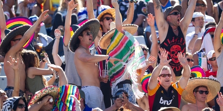 Fans get the Mexican wave going. Photo / Richard Robinson