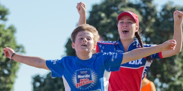 Regan Langford shows his pride in completing the course. Photo / Greg Bowker