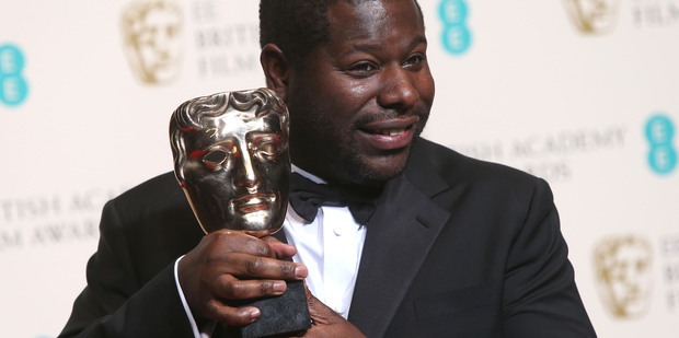 Steve McQueen shows off his best film award for 12 Years a Slave at the Baftas in London. Photo/AP