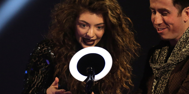 Lorde accepts the award for International Female Solo Artist at the Brit Awards. Photo/AP