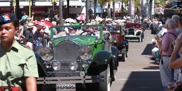 Crowds enjoy the Tremains Art Deco Parade through the streets of Napier today. Photo/Duncan Brown.