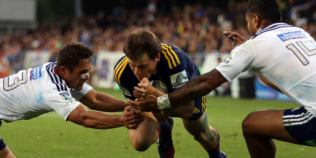 Ben Smith of the Highlanders scores a try during the round two Super Rugby match between the Highlanders and the Blues. Photo / Getty Images.