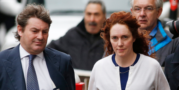 Rebekah Brooks, right, and her husband Charlie Brooks arrive at the Central Criminal Court in London. Photo / AP
