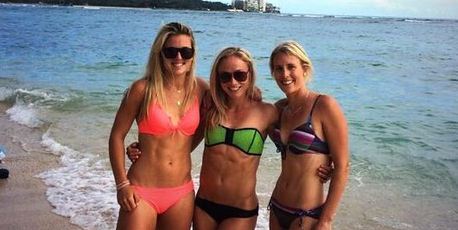 Gemma Flynn, Anita Punt and Emily Naylor flaunt their abs in Hawaii.