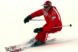 File photo of Formula One driver Michael Schumacher of Germany speeding down a course in the Madonna di Campiglio ski resort. Photo / AP