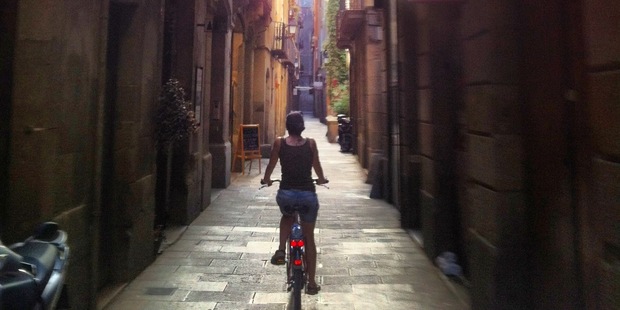 Cycling the streets of Barcelona, Spain, is one of the shore excursions possible aboard a Crystal Serenity cruise around Europe.