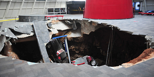 Several cars that collapsed into a sinkhole in Bowling Green, Kentucky, in February 2014. Photo / National Corvette Museum/AP