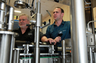 John Hancock, one of the founders of Trinity Hill winery with and bottle manager Bryce Brown. US winery owner Charles Banks plans to take a 67pc stake in the Hawkes Bay winery. File photo / APNZ John Hancock, one of the founders of Trinity Hill winery with and bottle manager Bryce Brown. US winery owner Charles Banks plans to take a 67pc stake in the Hawkes Bay winery. File photo / APNZ