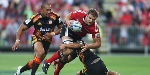Tackles like this one on Luke Whitelock typified the Chiefs defence in Christchurch. Photo / Getty Images