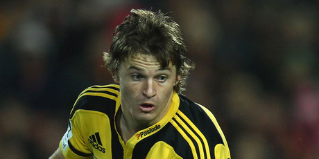 Beauden Barrett's battle with Willie le Roux was a highlight of the Hurricanes' win over the Cheetahs. Photo / Getty Images.