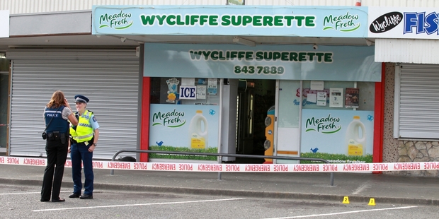 Police at the scene of yesterday's early morning robbery. Photo/Duncan Brown