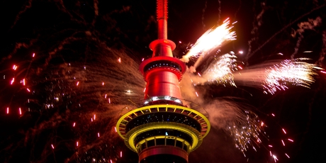 Fireworks explode off the Sky Tower last night to celebrate the end of the Lantern Festival. Photo / Richard Robinson