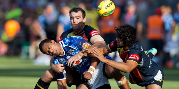 Glen Fisiiahi of the Warriors spills the ball as his team head to their 8-0 semifinal defeat at the hands of the Cowboys yesterday. Photo / Greg Bowker