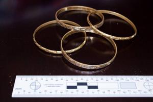 Police would like to hear of any sightings of the gold bangles and the distinctive pendant taken off the victim during the assault. Photo / Police