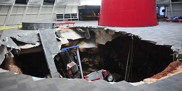 Several cars that collapsed into a sinkhole in Bowling Green, Kentucky, in February 2014. Photo / National Corvette Museum/AP