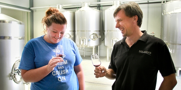 Winemaker Lauren Swift tests a sample with Chris Wilcock at the new Ash Ridge Bridge Pa Triangle winery. Photo/Warren Buckland