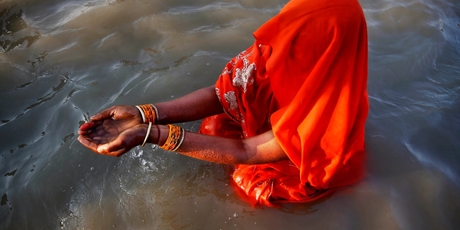 A Hindu offers prayers in the filthy waters of the Yamuna. Picture / AP