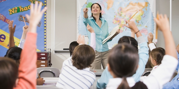 It's a popular misconception that teachers - and others in the super scheme - are not eligible to join KiwiSaver. Photo / Getty Images.