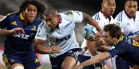 The Blues' Charles Piutau makes a break against the Highlanders in Dunedin. Photo / Getty Images