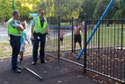 Police inspect a section of fence at Cornwall Park that injured a 3-year-old girl on Saturday. Photo/Duncan Brown Police inspect a section of fence at Cornwall Park that injured a 3-year-old girl on Saturday. Photo/Duncan Brown