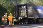 The driver of this truck became aware that his load was ablaze behind him only when a member of the public flagged him down. Photo/George Novak The driver of this truck became aware that his load was ablaze behind him only when a member of the public flagged him down. Photo/George Novak