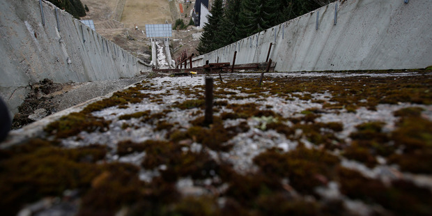 The abandoned ski jumping facility is seen covered in moss at Mt. Igman near Bosnian capital of Sarajevo. Photo / AP