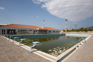 2012 file photo of murky water and rubbish fill an abandoned training pool for athletes at the Olympic village on the northern fringes of Athens. Photo / AP