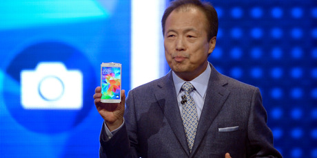 Samsung CEO J.K. Shin presents the new Samsung Galaxy S5 at the Mobile World Congress, the world's largest mobile phone trade show in Barcelona, Spain. Photo / AP