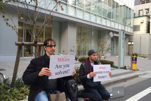 Bitcoin trader Kolin Burges, right, of London and American Aaron (only his first name was given) protest outside the office tower housing Mt. Gox in Tokyo. Photo / AP
