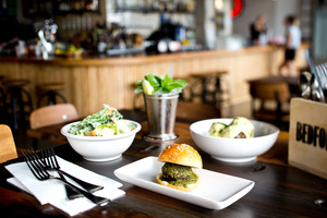 Meat ball slider, caesar salad and meat balls on polenta from Bedford Soda & Liquor. Photo / Babiche Martens.