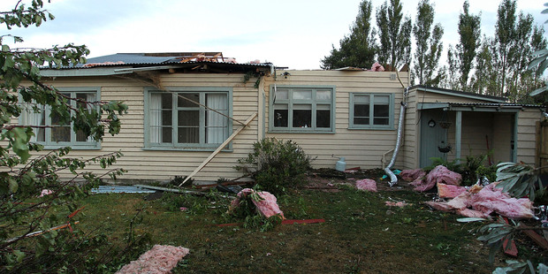 A tornado-damaged house at CJ's Drive Thru Plant Farm near Amberley, North Canterbury. Photo / Martin Hunter