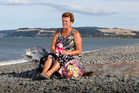 Kay Hamilton at Haumaoana beach where her her fox terrier dog was hit by a quad bike. Photo/Glenn Taylor Kay Hamilton at Haumaoana beach where her her fox terrier dog was hit by a quad bike. Photo/Glenn Taylor