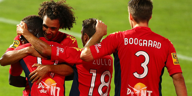 Adelaide United celebrate a goal in their 5-1 win over the Phoenix. Photo / Getty Images