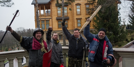 Security and protester volunteers outside the presidential countryside retreat. Photo / AP