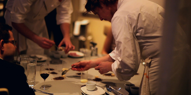 Chef Grant Achatz sparked an online discussion when he tweeted about a crying 8-month-old in his upscale restaurant.