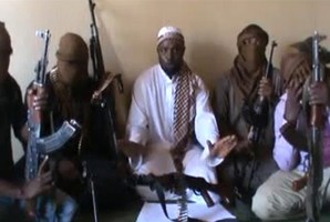 This screengrab taken from a video released on You Tube on April 12, 2012 apparently shows Boko Haram leader Abubakar Shekau (C) sitting flanked by militants. Photo / AFP
