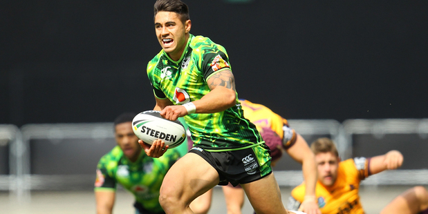 Shaun Johnson makes a break during the NRL pre-season match between the Warriors and the Brisbane Broncos. Photo /Getty Images