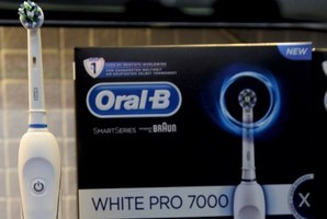 A mobile device attached to a toothbrush will keep track of your dental health.
Photo / AFP