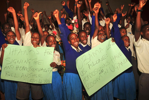 Ugandan pupils from different schools take part in an event organised by born-again Christians to celebrate the signing of a new anti-gay bill. Photo / AP
