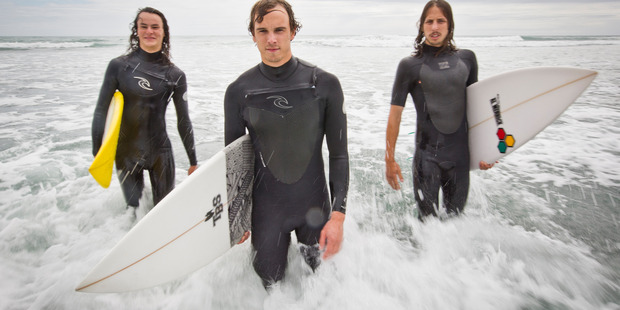 Liam Kennedy, Darren Celliers and Caleb Lemkus. The group helped save a family that got into trouble at Bethells Beach. Photo / Greg Bowker