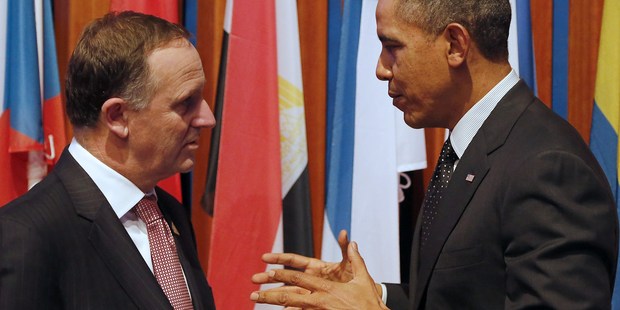 John Key and Barack Obama talk following the closing session of the Nuclear Security Summit in The Hague last year. Photo / Getty Images